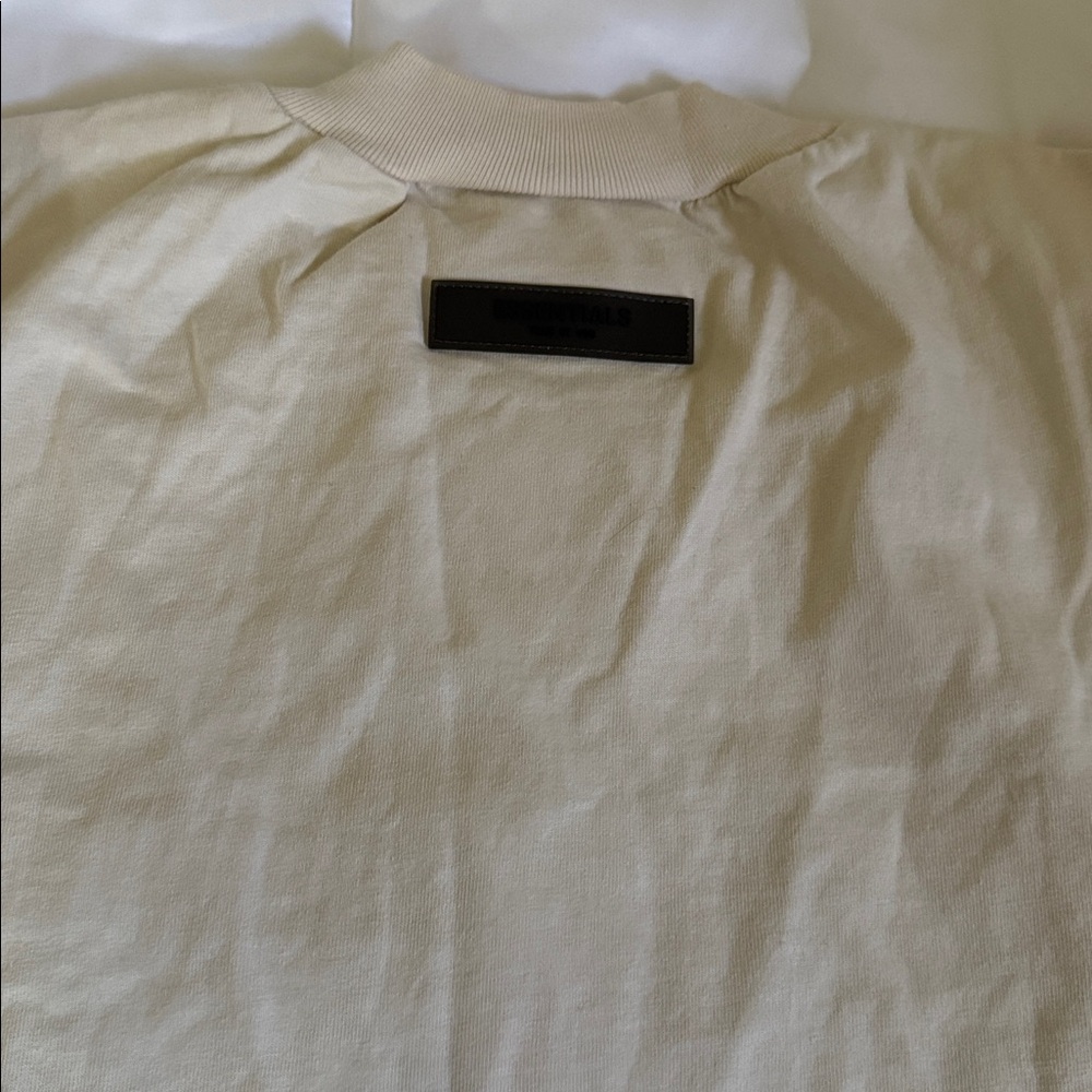 Essentials Raised Logo T‑Shirt in Cream - Picture 3 of 3